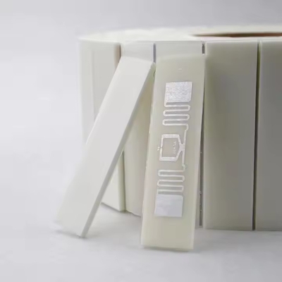 860-960mhz UHF Foam Backed Dogbone RFID Tags ผ้าปูฝนสําหรับระบบเวลาแข่งขัน